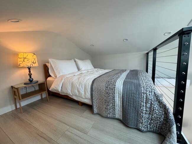 queen sized bed in sleeping loft - 3744 Granada Ave