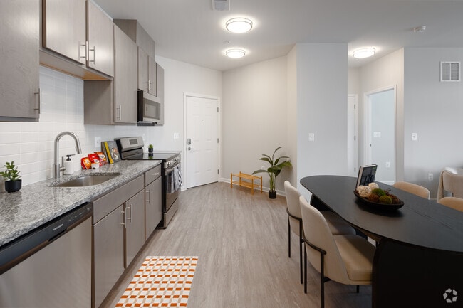 2 habitaciones, 2 baños - 911 pies cuadrados - Cocina - Joyfield Flats at Woodbridge