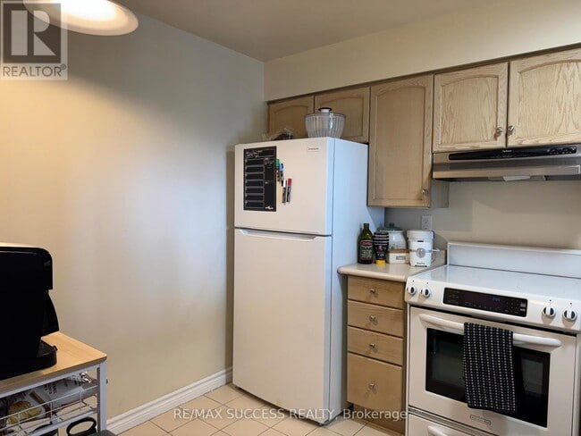 Building Photo - 350-2350 Rathburn Rd W