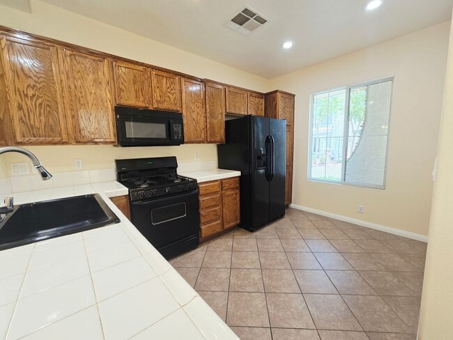 Building Photo - 8295 Golden Flowers St