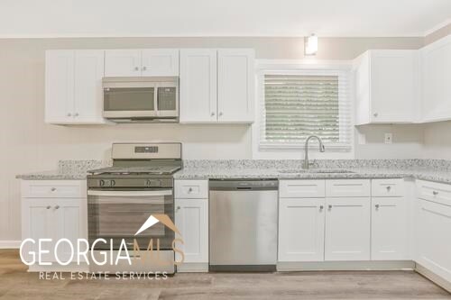 Foto del edificio - 5868 Hallwood Ct