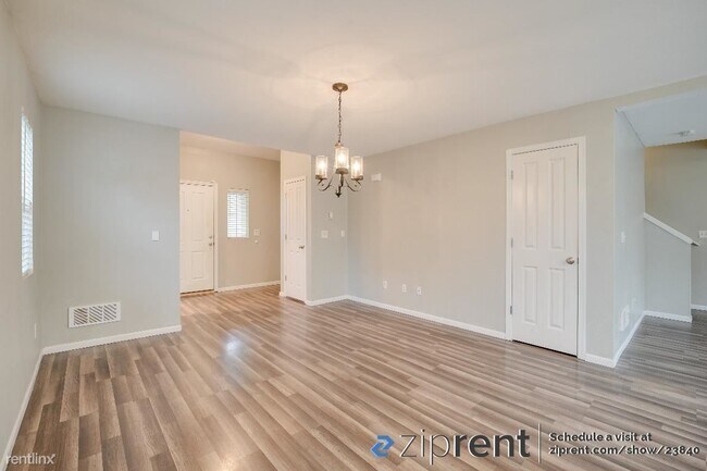 Building Photo - 2 br, 2.5 bath House - 4406 Roxanna Loop S...