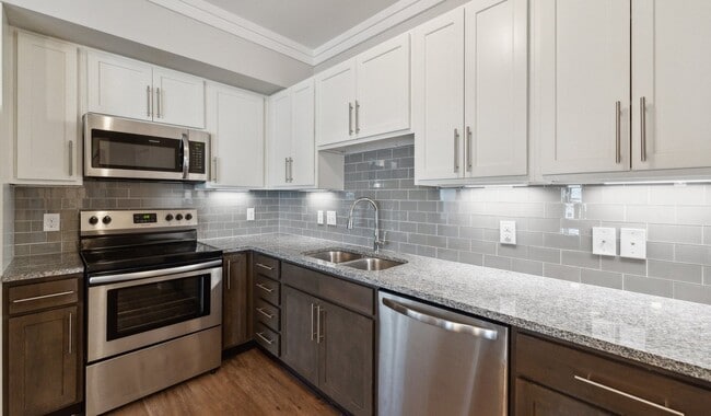 Try out a new recipe in your modern kitchen - Brizo Apartments