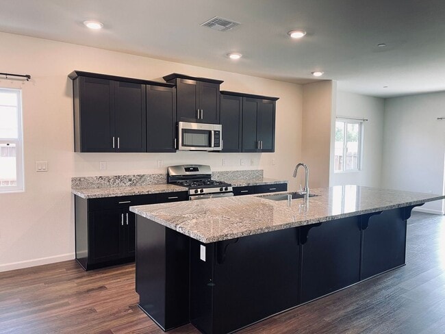 Building Photo - LIVE BIG in the Heart of Fowler! $250 off ...