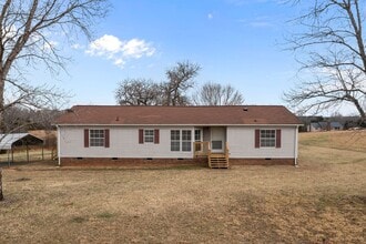 Building Photo - 5440 Snow Camp Rd