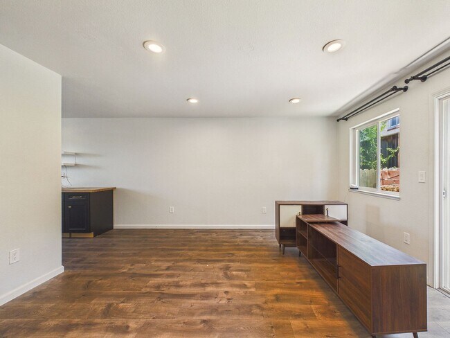 Building Photo - Updated 2 Bed / 1.5 Bath Townhome – In-Unit Washer & Dryer + Garage Parking – $2,800/month