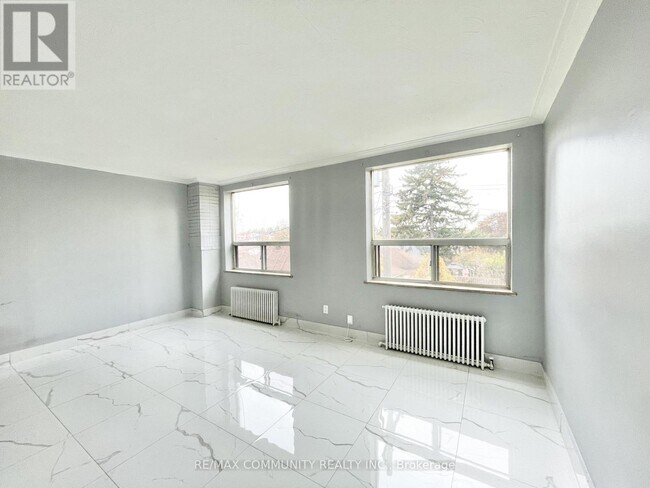 Building Photo - 2624 Eglinton Ave E