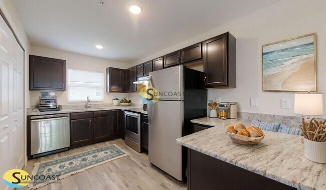 Foto del edificio - 9033 N Travis Dr