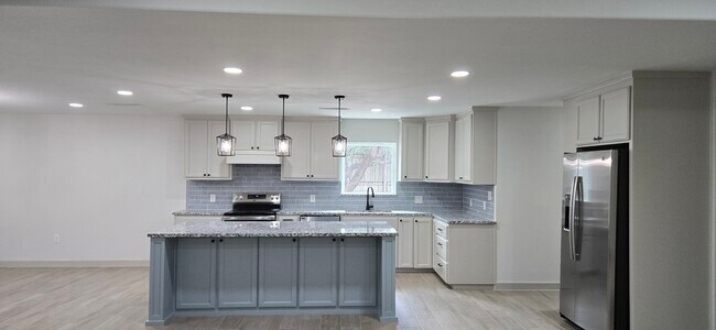 Foto del edificio - 3809 Buddy Owens Blvd