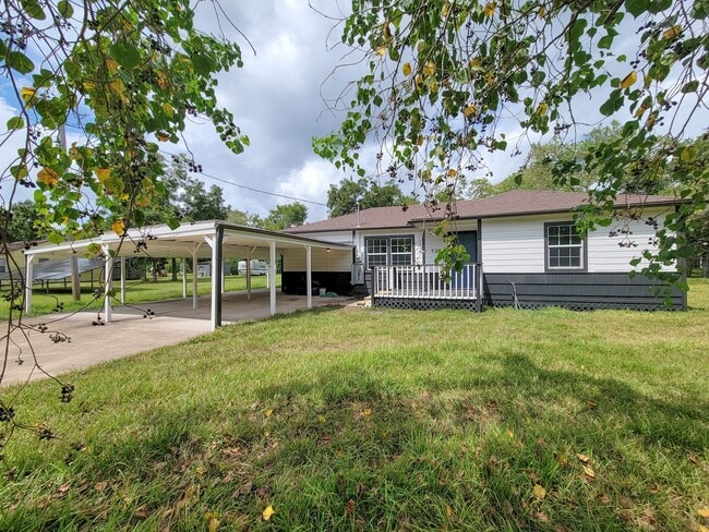 Building Photo - REMODELED 4 BEDROOM 2 BATH LEASE HOME IN A...