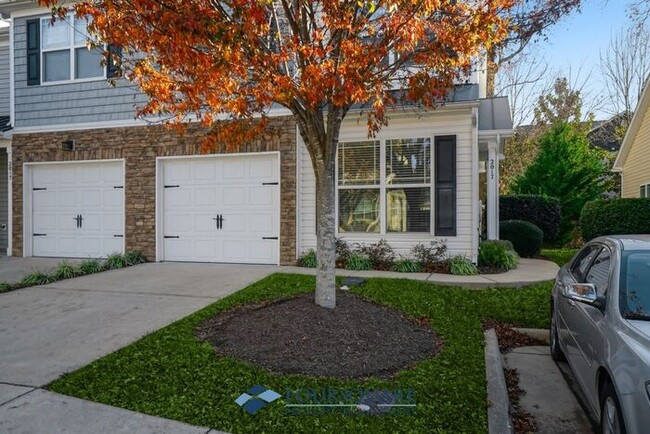 Building Photo - Lovely End-Unit Townhome with Office Space, Fenced Yard & Garage – Minutes from Downtown Raleigh