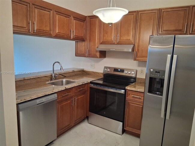 Building Photo - 10907 Royal Palm Blvd