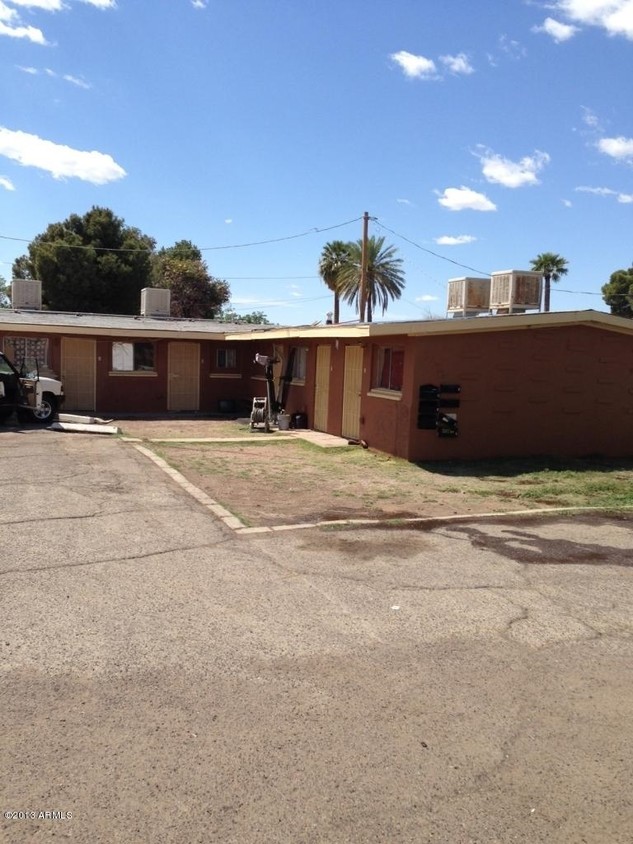 owner has recently replaced all security doors with black ones - 1812 N 35th Ave