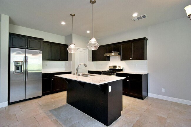 Foto del edificio - 3 br, 2 bath House - 3404 Carson Ave