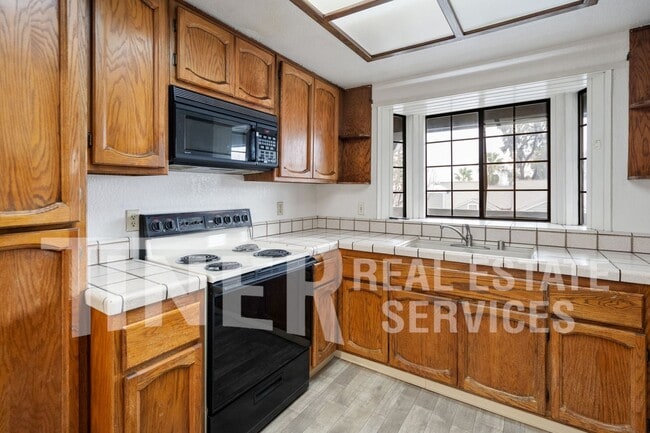 Building Photo - Unique 2 -Story 2 Bedroom Condo! with New ...