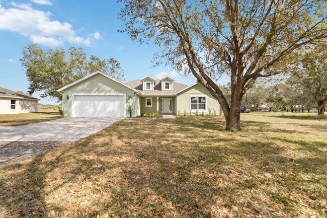 Building Photo - Beautiful Brand New 4/2 Home on 3/4 Acre F...