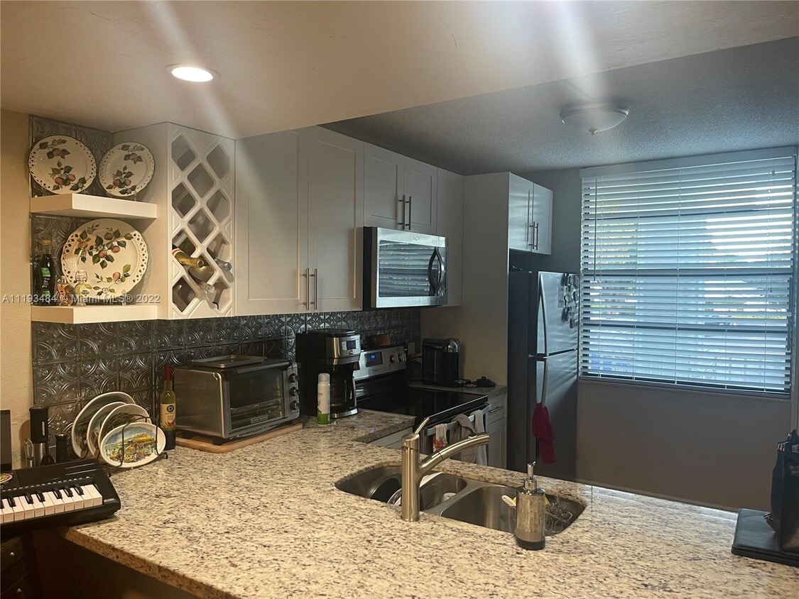 1711 Whitehall Dr Unit 203, Davie, FL 33324 Condo for Rent in Davie