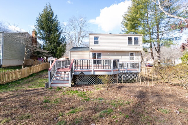 Rear of house with deck - 16003 Fairway Dr