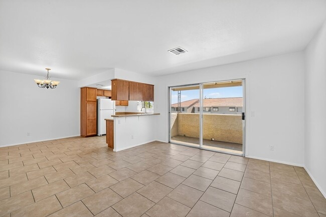 Building Photo - READY TO MOVE-IN UPPER LEVEL 2-BEDROOM CONDO!