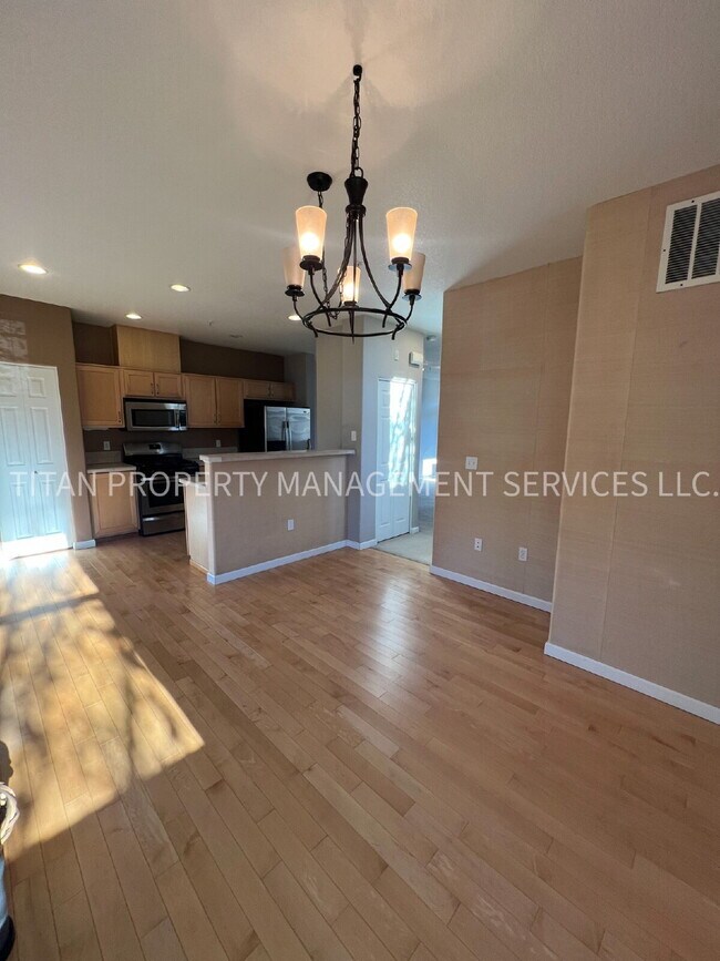 Photo - Beautiful Three Story Townhouse with Gas Fireplace, Balcony & 2-Car Garage