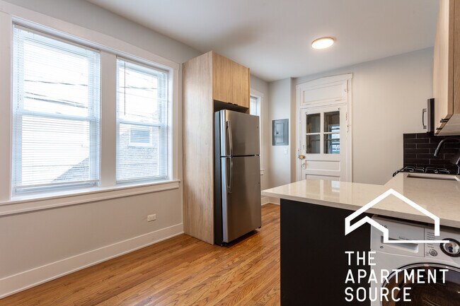Foto del edificio - 4011 N Lowell Ave