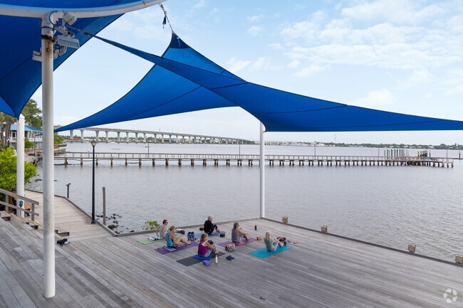 You can join the yoga class by the Riverwalk in Downtown Stuart.