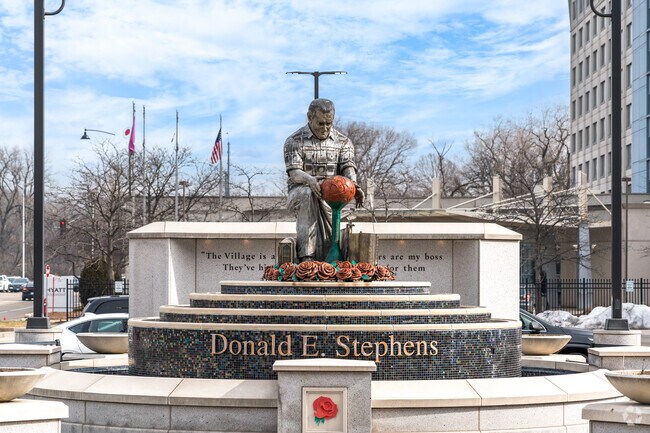 The landmark Donald E. Stephens statue features the mayor with the water tower.