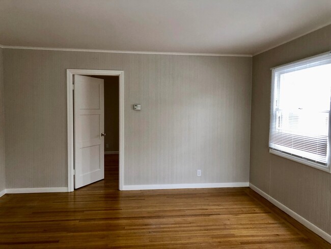 Building Photo - Delightful and Charming Home Tucked Away o...