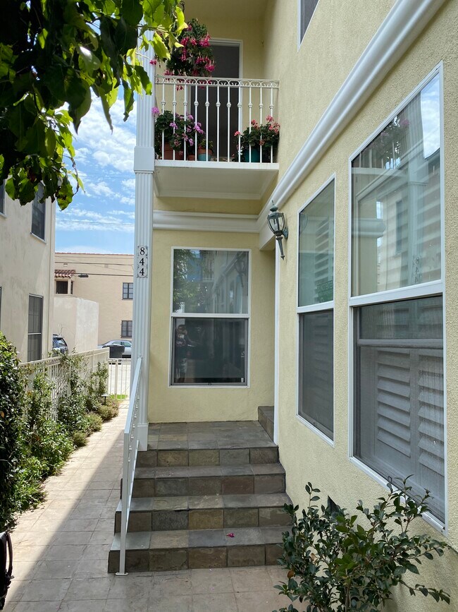 Walkway to stairs leading to Unit - 844 12th St