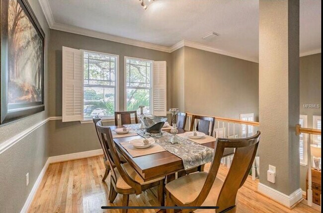 Dining room with hardwood floors - 3315 W De Leon St