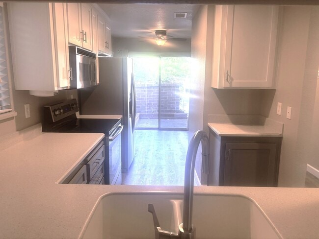 Building Photo - Beautiful 3-Bedroom Condo with Private Out...