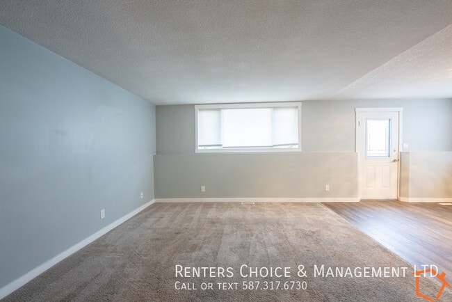 Building Photo - 2 Bedroom Basement Suite, Assigned Parking...