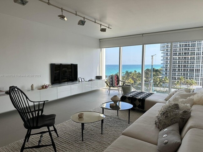 Building Photo - 10275 Collins Ave