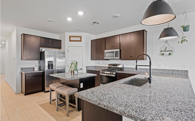 Building Photo - Bright, Spacious, and Ready for You to Cal...