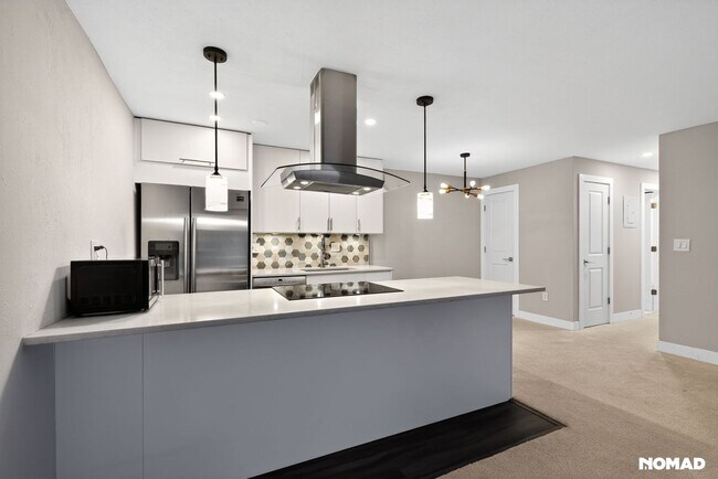 Foto del edificio - 695 Manhattan Dr