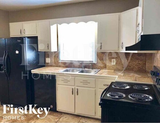 Foto del edificio - 7615 E 48th St