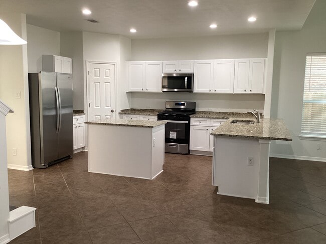 Building Photo - 6434 Tea Tree Dr