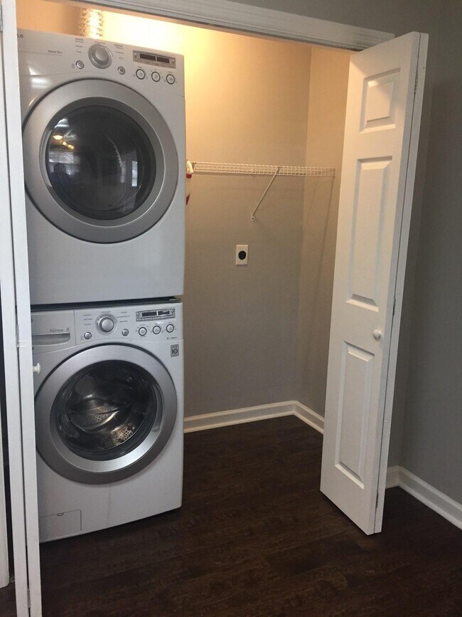 Laundry closet off kitchen with Stackable washer and dryer included. - 6080 Old Dayton Pike