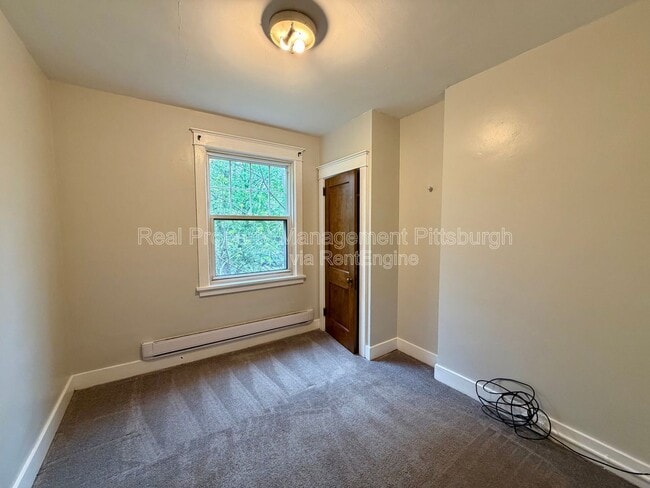 Photo - 5550 Wilkins Ave Apartment