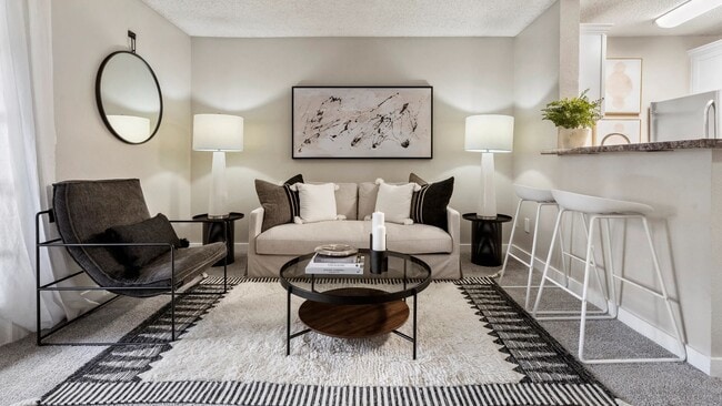 Dive into your spacious living room, where your plush carpeting option adds a touch of comfort. Your cozy oasis awaits! - Beacon at 601