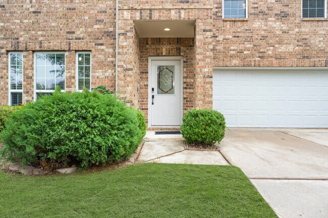 Foto del edificio - "Charming 4-Bed Home with Elegant Granite Touches & 2.5 Baths!"