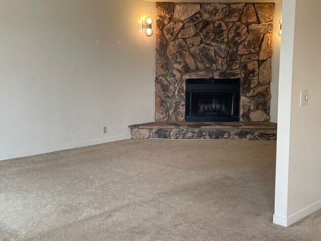 Fireplace - not carpet was replaced with New Flooring - 540 36th Ave