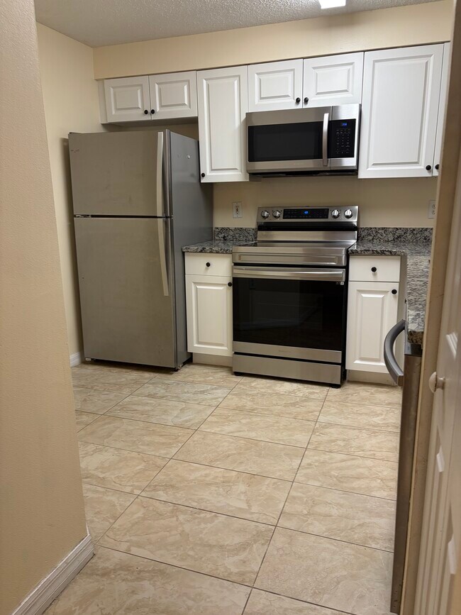 Building Photo - Palm Villa Condominium