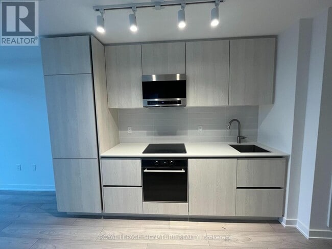 Building Photo - 110 Broadway Ave