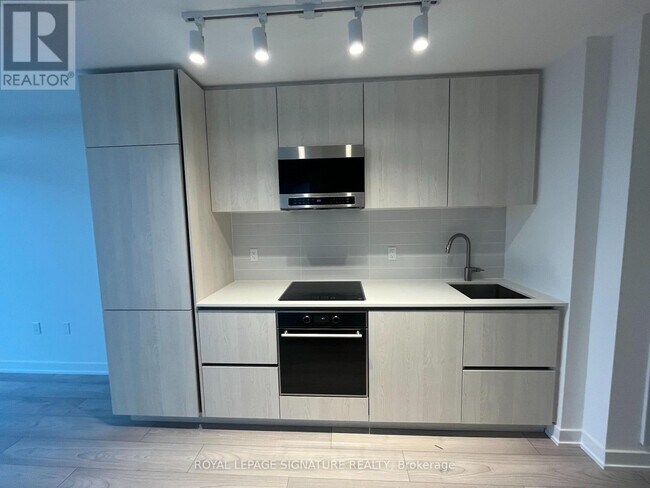 Photo du bâtiment - 110 Broadway Ave