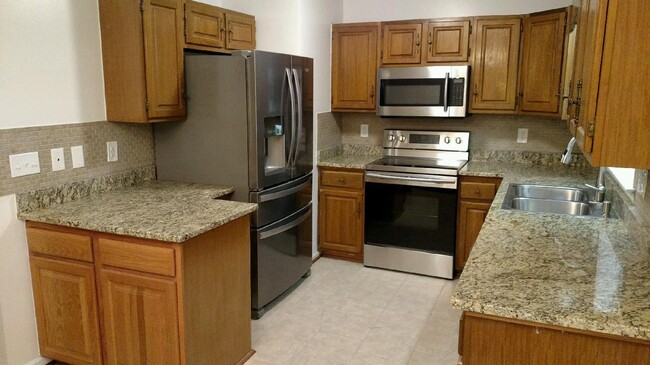 Kitchen from a very similar unit, rennovated at the same time as current unit for rent - 1410 Skyline Dr