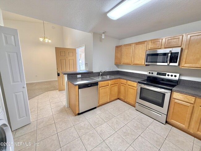 Building Photo - 6788 Manotak Oaks Dr