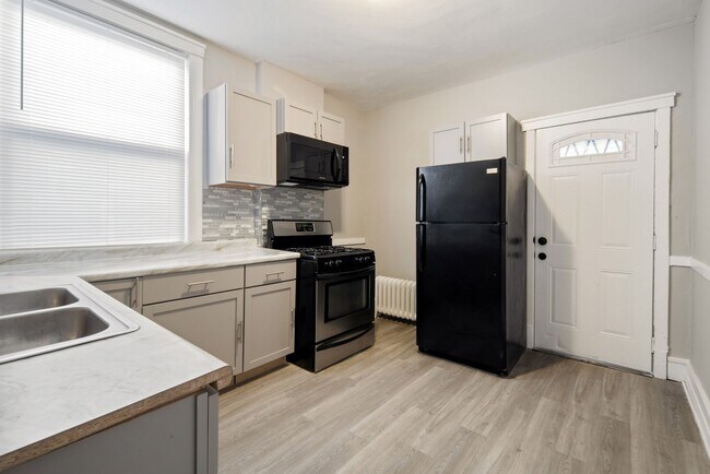 Foto del edificio - 6647 South Hartwell Avenue, Unit 2 - 6649