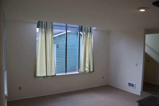 Building Photo - Beautiful and Bright Corner Lot Home in Ev...