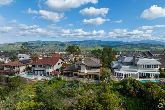 Orange homes offer hillside views and peaceful suburban living.